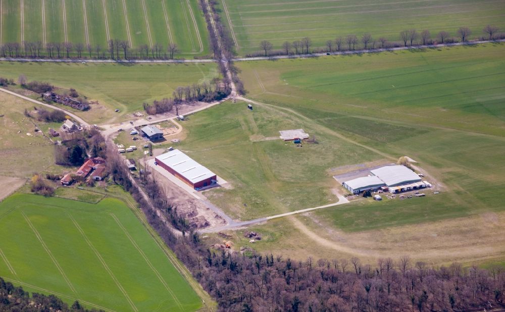 Aerial photograph Paulinenaue - Runway with tarmac terrain of airfield Bienenfarm GmbH in Paulinenaue in the state Brandenburg, Germany
