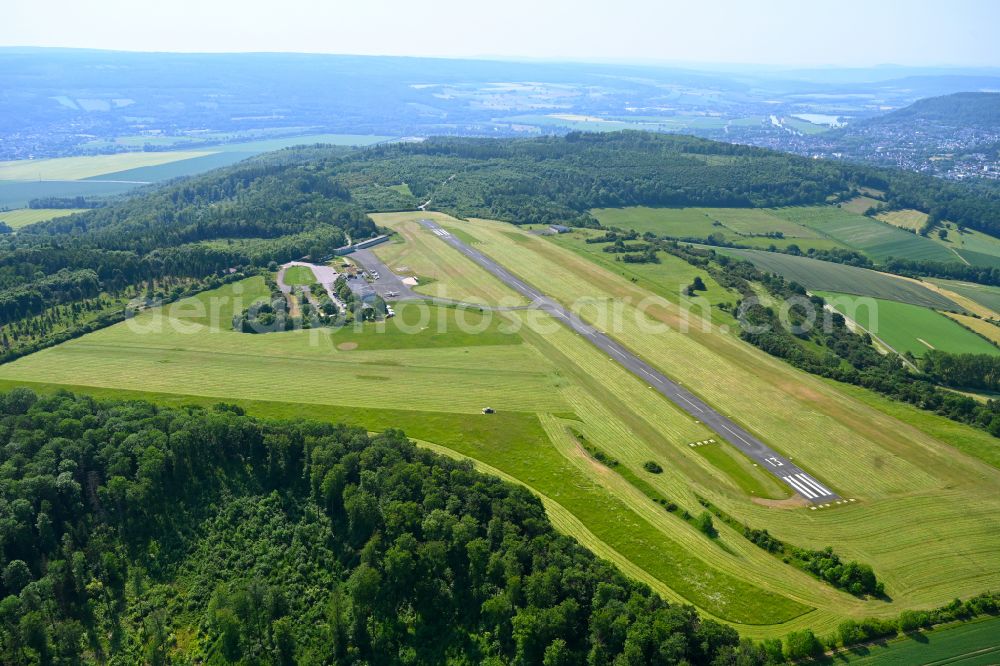 Aerial image Brenkhausen - Runway with tarmac terrain of airfield EDVI Hoexter-Holzminden on street Raeuschenbergstrasse in Brenkhausen in the state North Rhine-Westphalia, Germany