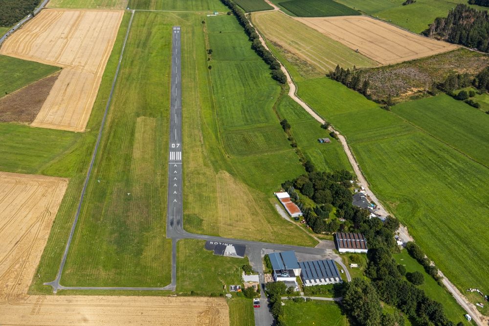 Brilon from the bird's eye view: Runway with tarmac terrain of airfield Sonderlandeplatz Brilon/Hochsauerland in Brilon in the state North Rhine-Westphalia, Germany