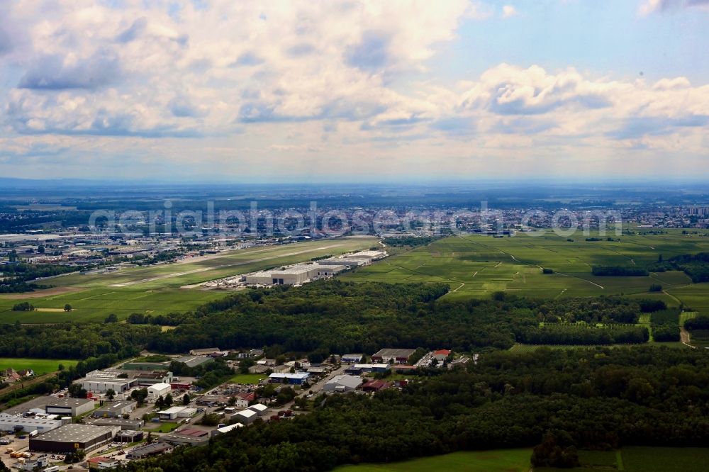 Colmar from above - Runway with tarmac terrain of airfield Colmar-Houssen in Colmar in Grand Est, France