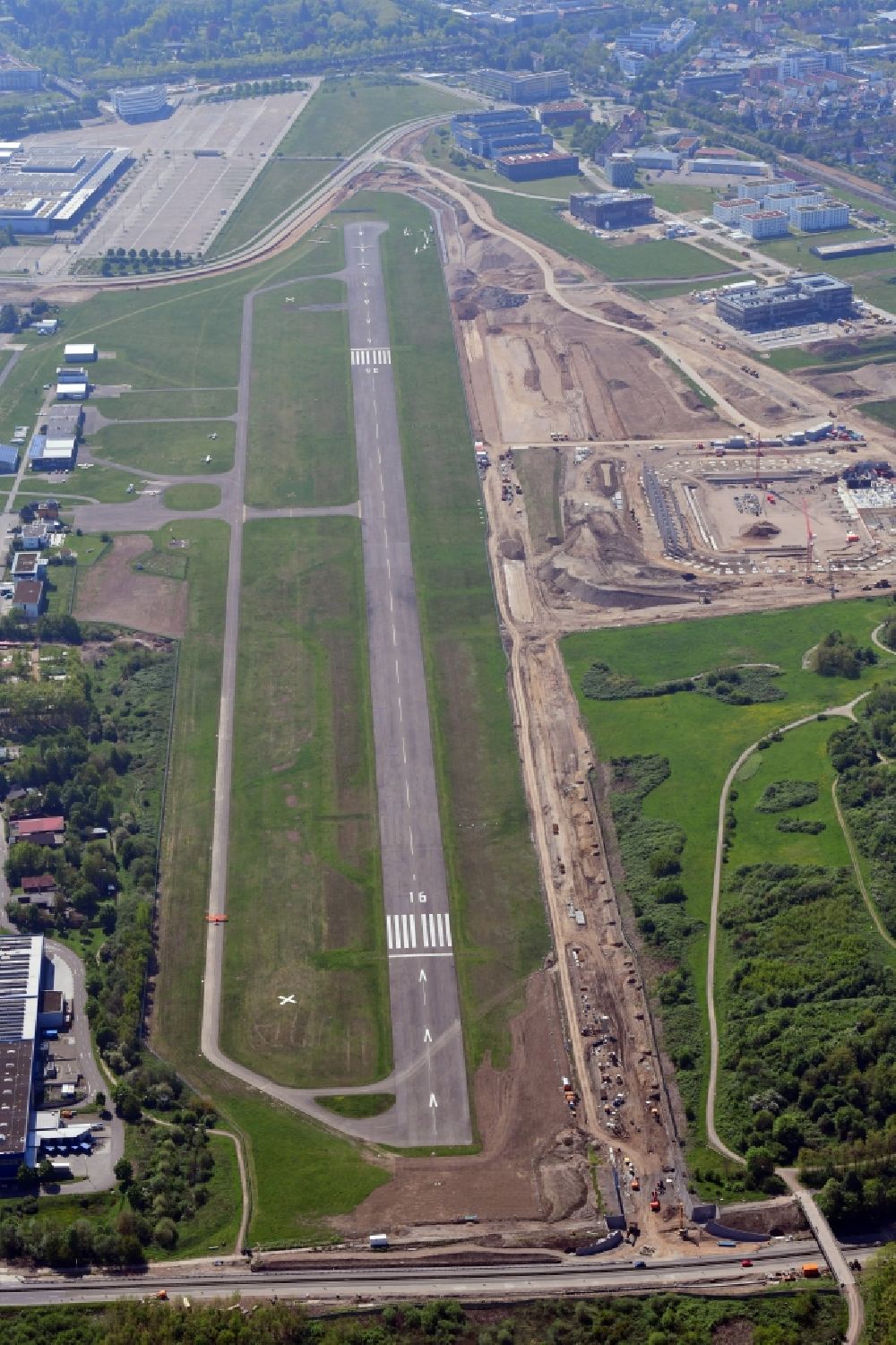 Aerial image Freiburg im Breisgau - Runway of airfield EDTF in Freiburg im Breisgau in the state Baden-Wurttemberg, Germany. At the construction works area the new stadium of the SC Freiburg is built
