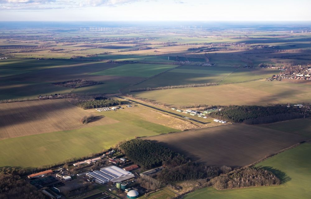 Fehrbellin from the bird's eye view: Runway with tarmac terrain of airfield Fehrbellin in Fehrbellin in the state Brandenburg, Germany