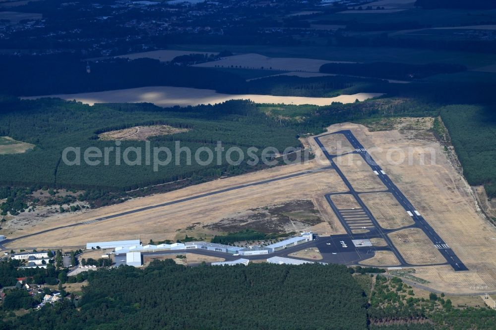 Trebbin from the bird's eye view: Runway with tarmac terrain of airfield Flugplatzgesellschaft Schoenhagen mbH in Schoenhagen in the state Brandenburg