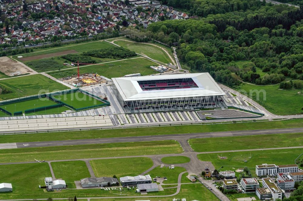 Aerial image Freiburg im Breisgau - Runway with tarmac terrain of airfield Freiburg with neuem SC Fussballstadion in Freiburg im Breisgau in the state Baden-Wuerttemberg, Germany