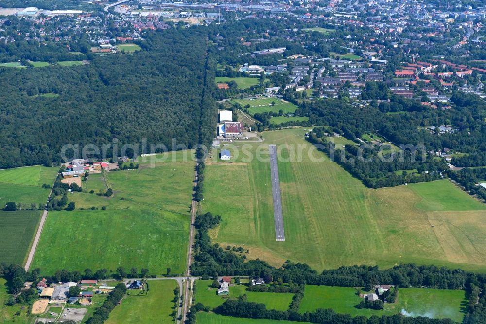 Neumünster from above - Runway with tarmac terrain of airfield in Neumuenster in the state Schleswig-Holstein, Germany