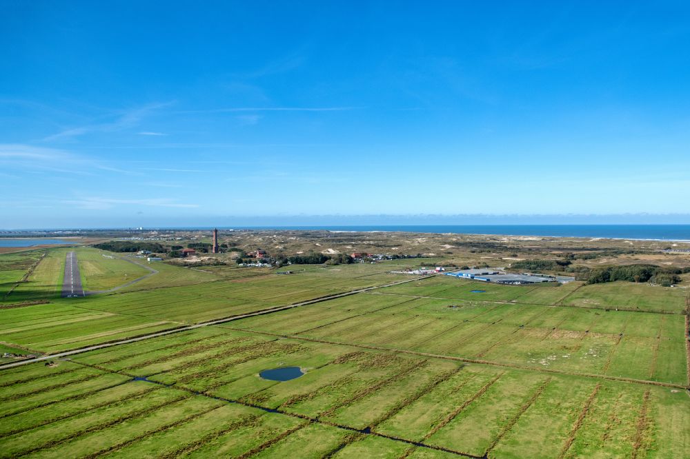 Aerial photograph Norderney - Runway with tarmac terrain of airfield with dune landscape on Norderney island in the state Lower Saxony
