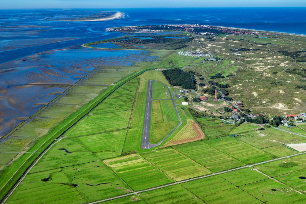Aerial image Norderney - Runway with tarmac terrain of airfield with dune landscape on Norderney island in the state Lower Saxony