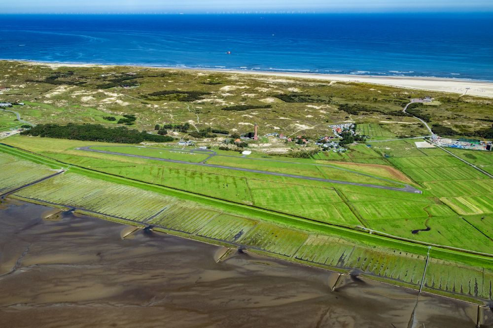 Aerial photograph Norderney - Runway with tarmac terrain of airfield with dune landscape on Norderney island in the state Lower Saxony