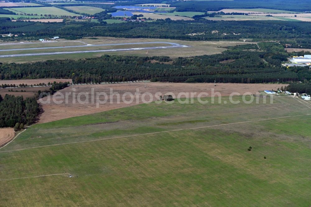 Parchim from the bird's eye view: Runway with tarmac terrain of airfield in the district Slate in Parchim in the state Mecklenburg - Western Pomerania, Germany