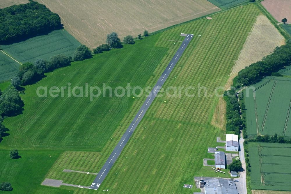 Rinteln from the bird's eye view: Runway with tarmac terrain of airfield EDVR in Rinteln in the state Lower Saxony, Germany