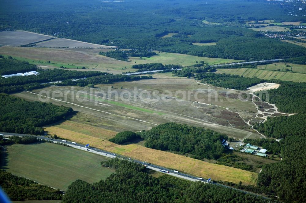 Saarmund from above - Runway with tarmac terrain of airfield in Saarmund in the state Brandenburg, Germany