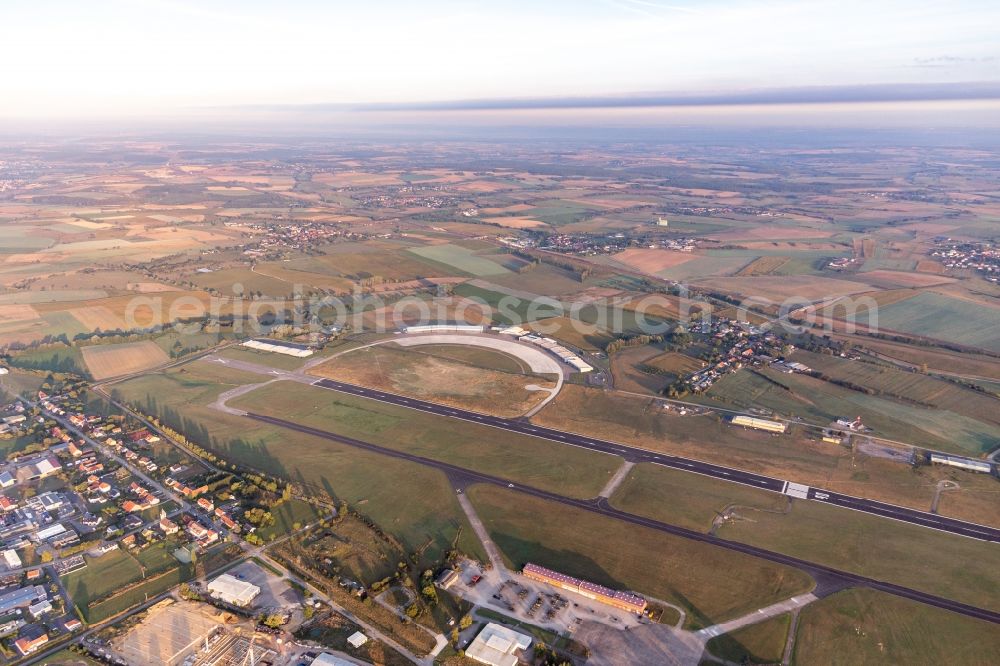 Saint-Jean-Kourtzerode from the bird's eye view: Buildings and runway with tarmac of the Phalsbourg-Bourscheid military airfield Camp LA Horie in Saint-Jean-Kourtzerode in Grand Est, France
