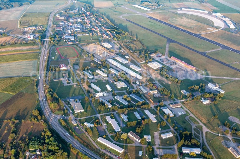 Saint-Jean-Kourtzerode from above - Buildings and runway with tarmac of the Phalsbourg-Bourscheid military airfield Camp LA Horie in Saint-Jean-Kourtzerode in Grand Est, France