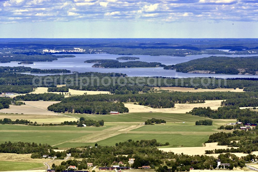 Stockholm from above - Runway with tarmac terrain of airfield Ska-Edeby in the district Ska-Edeby in Stockholms laen, Sweden