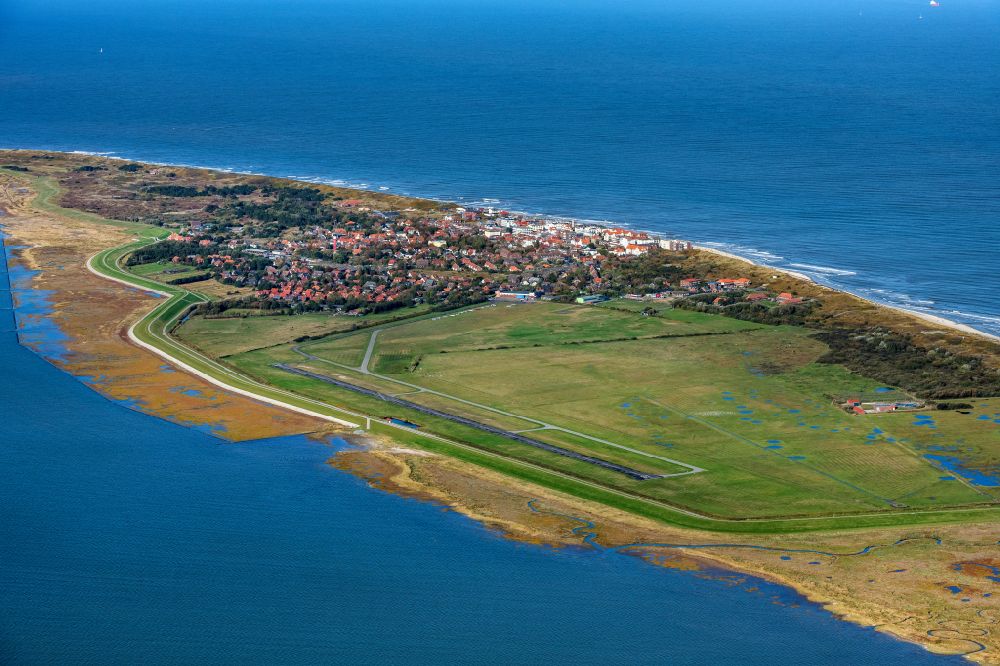 Wangerooge from the bird's eye view: Runway with tarmac terrain of airfield in Wangerooge in the state Lower Saxony, Germany