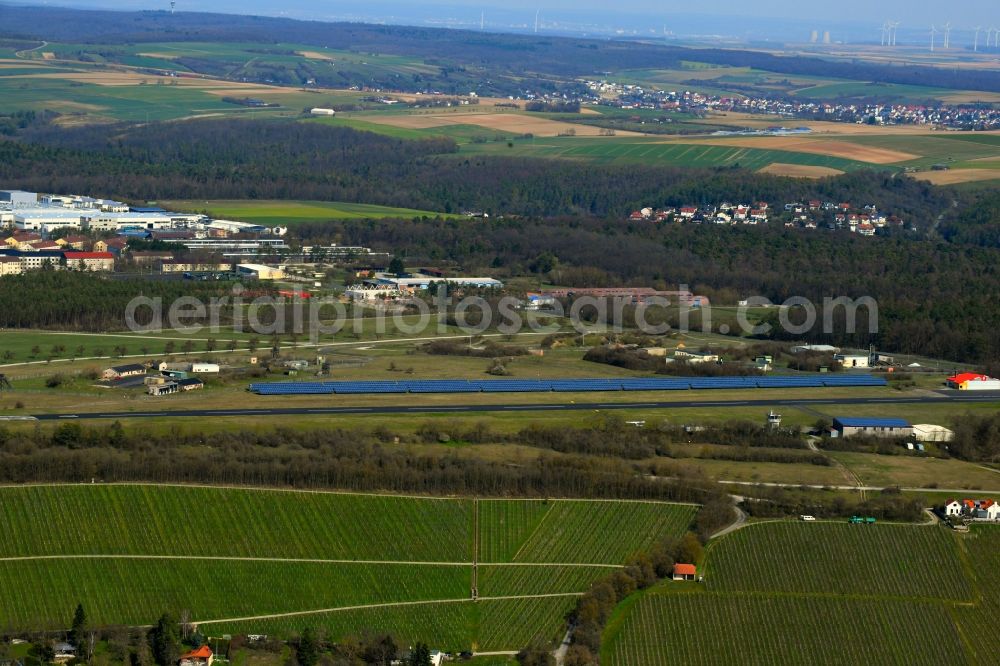 Würzburg from the bird's eye view: Airfield Wuerzburg-Schenkenturm at the runway between vineyards, photovoltaic system and Balthasar-Neumann-Kaserne in Wuerzburg in the state Bavaria, Germany