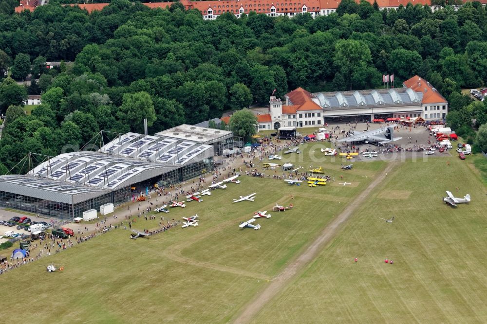 Aerial photograph Oberschleißheim - Halls and grounds of the Flugwerft Schleissheim in Oberschleissheim near Munich in Bavaria. For Fly-In occasion of the 25th anniversary of the Flugwerft historical and current aircraft are on display on the open spaces, including a C-160 Transall. The Flugwerft is a branch of the Deutsches Museum