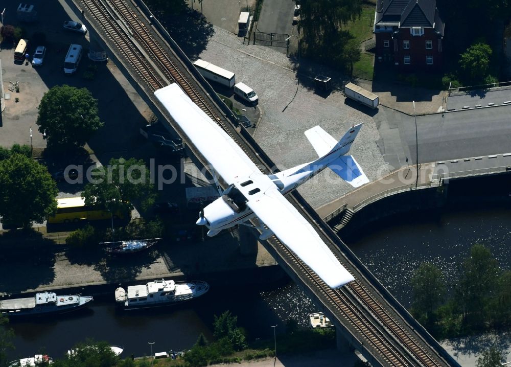 Hamburg from above - Cessna 172N Skyhawk D-EAHN Aircraft in flight over the airspace in the district Hammerbrook in Hamburg, Germany