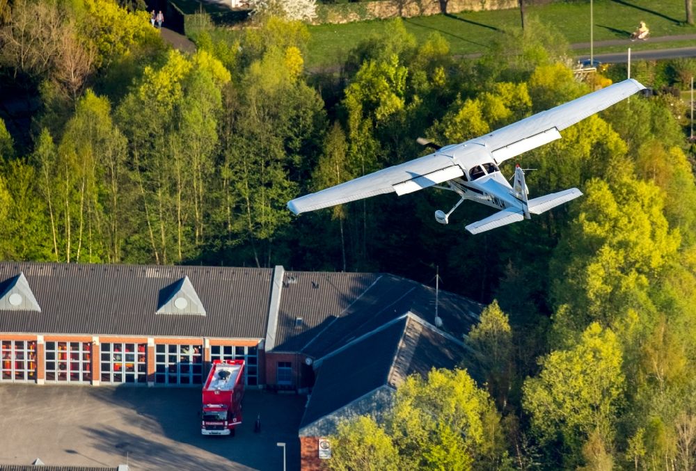 Aerial image Hamm - Cessna 172 with the registration D-EWLH in flight for landing at the airfield in Hamm in North Rhine-Westphalia