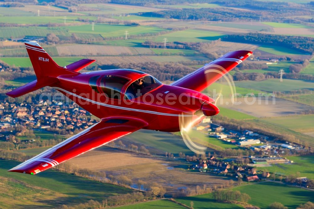 Deinste from above - Glasair SH2R Aircraft in flight over the fields above Deinste in the state Lower Saxony, Germany