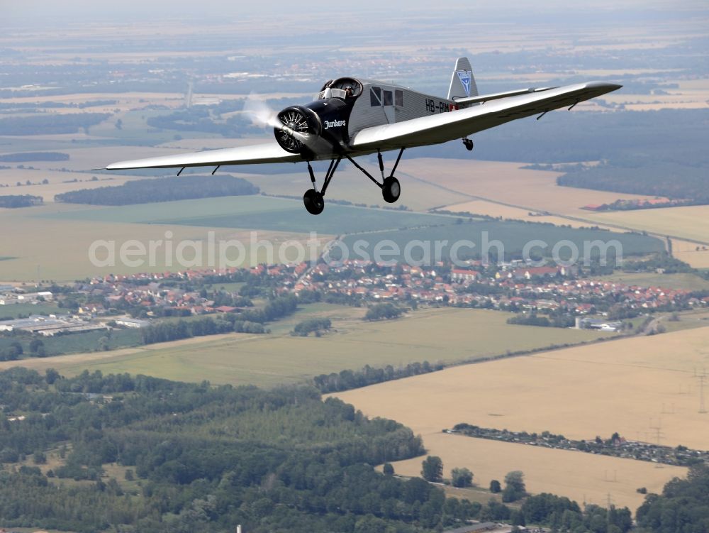 Aerial image Dessau - Junkers F13 Aircraft in flight over the airspace in Dessau in the state Saxony-Anhalt, Germany