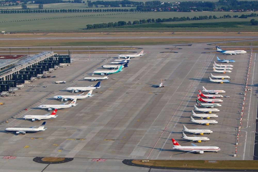 Schönefeld from the bird's eye view: Views of the apron of the BER airport in Schoenefeld in the State of Brandenburg. The aircrafts are flown on the occasion of the Champion League final 2015