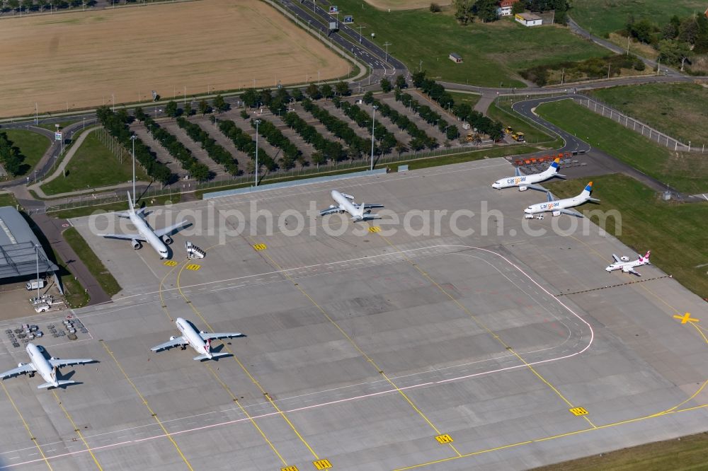 Aerial photograph Schkeuditz - Aircraft on the parking position - parking area on the Airport Leipzig/ Halle in Schkeuditz in the state Saxony, Germany