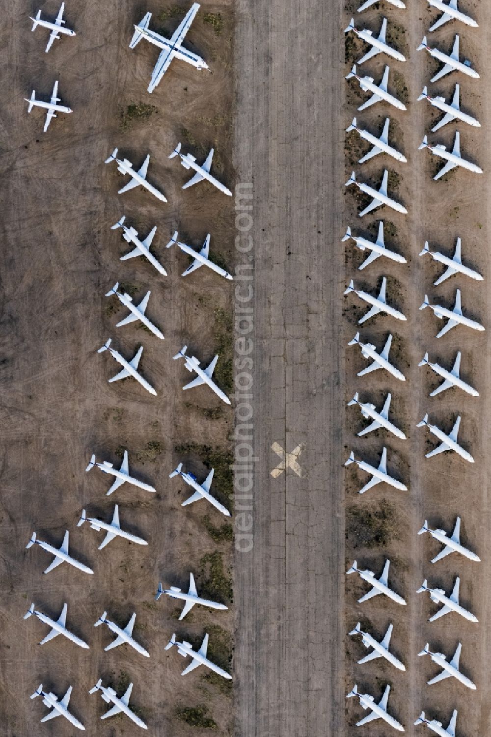 Kingman from above - Passenger planes parked in the aircraft graveyard on racks for recycling and scrapping at Kingman Airport in Arizona, USA