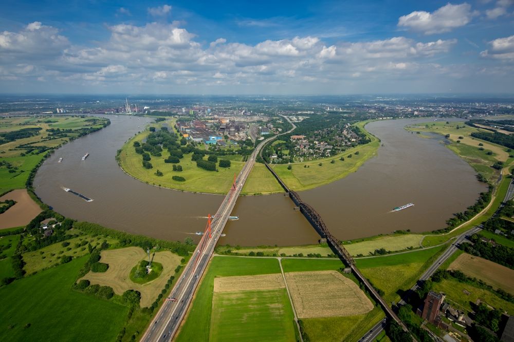 Aerial image Duisburg - River - bridge construction - A42 highway bridge and railway bridge over the Rhine in Duisburg in North Rhine-Westphalia