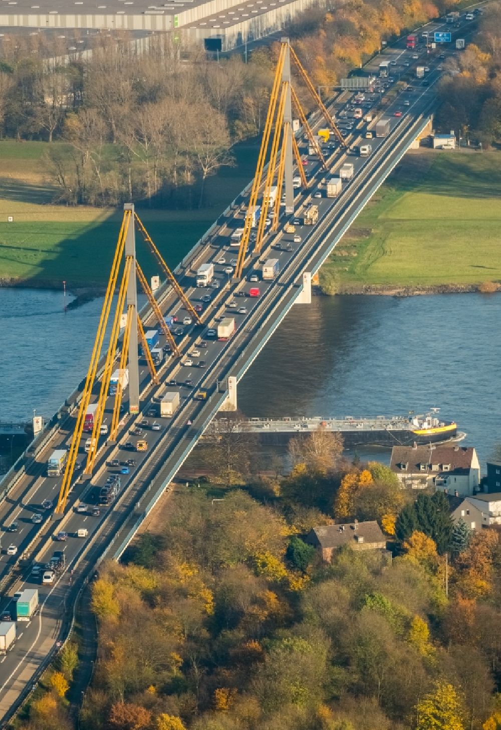 Aerial image Duisburg - River - bridge construction - A42 highway bridge over the Rhine in Duisburg in North Rhine-Westphalia