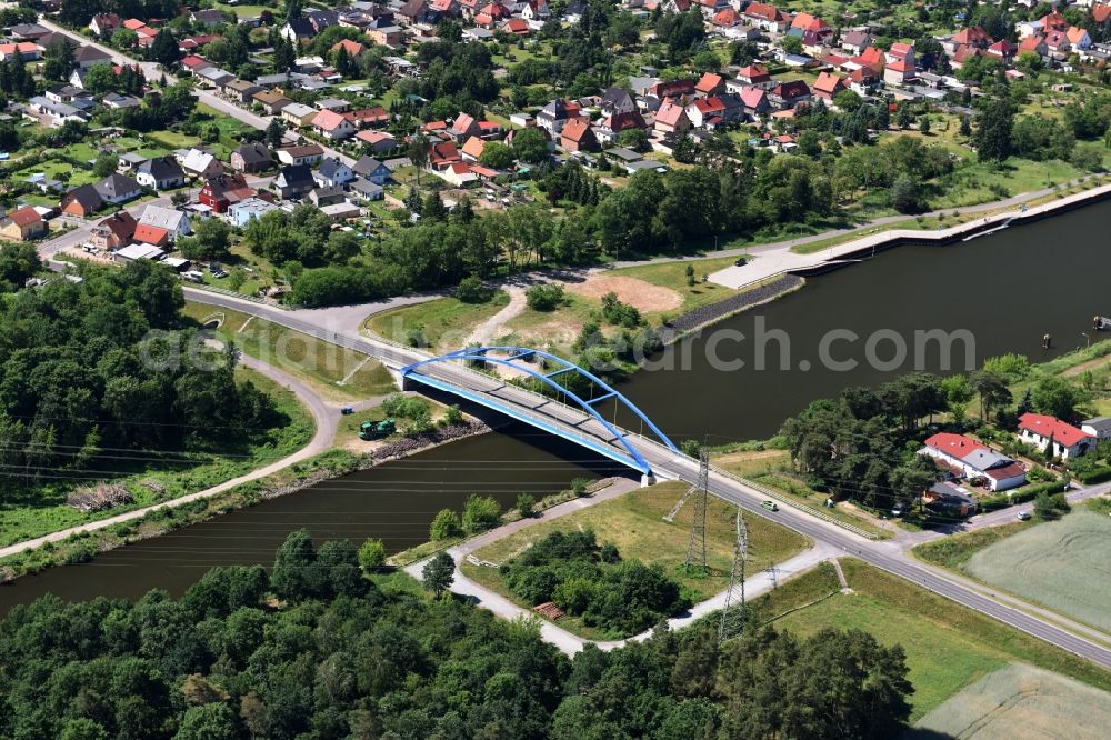 Aerial photograph Wusterwitz - Strassenbruecke Wusterwitz Bridge across the Elbe-Havel-Canal in the North of Wusterwitz in the state of Brandenburg. The county road L96 takes its course across the blue steel arc bridge