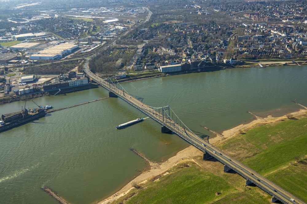Aerial image Uerdingen - River - bridge construction Krefeld-Uerdinger Bruecke ueber den Rhein in Uerdingen at Ruhrgebiet in the state North Rhine-Westphalia, Germany