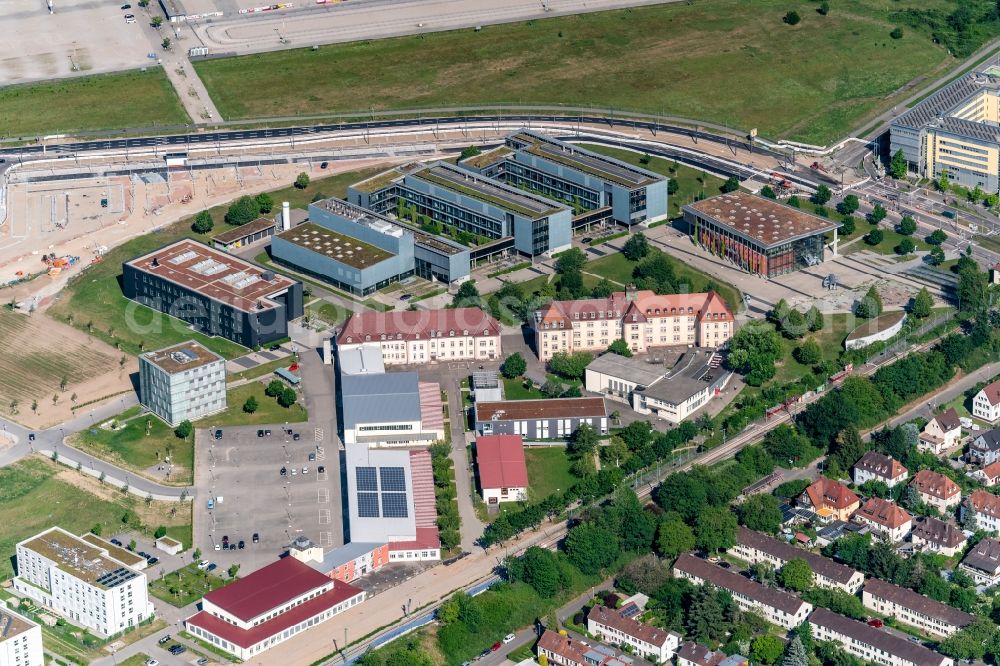 Aerial photograph Freiburg im Breisgau - Research building and office complex of Albert-Ludwigs-Universitaet Freiburg on Georges-Koehler-Allee next to the construction works of the stadium for sports club Freiburg in Freiburg im Breisgau in the state Baden-Wurttemberg, Germany