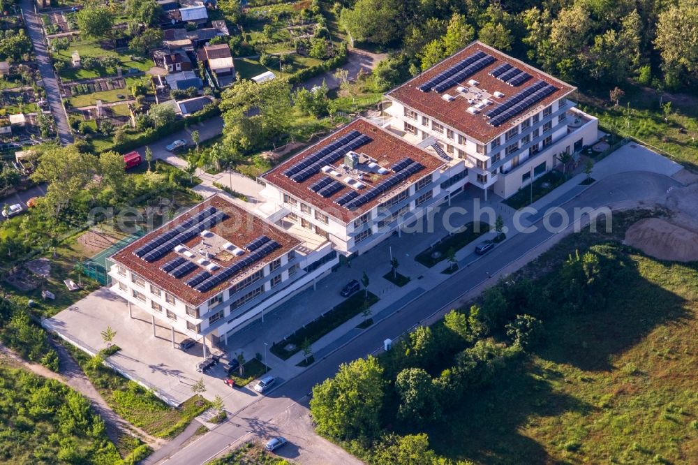 Karlsruhe from the bird's eye view: Research building and office complexes in the Technologiepark, Freie Duale Fachakademie, Elementi Kinderhaus und School in the Technido at the Konrad-Zuse-Str. in Karlsruhe in the state Baden-Wurttemberg, Germany