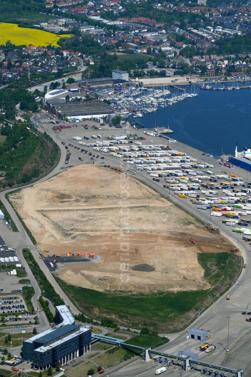 Aerial photograph Travemünde - Construction site of building complex and distribution center on the site of Terminal Skandinavienkai in the district Ivendorf in Travemuende in the state Schleswig-Holstein, Germany