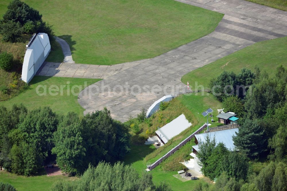 Werneuchen from above - View at for recreation and leisure converted former airplane shelter at the airfield in Werneuchen in the federal state of Brandenburg