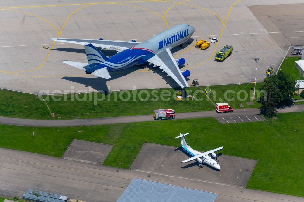 Filderstadt from the bird's eye view: Freight plane cargo machine - aircraft Boeing 747-428(BCF) with the identifier N952CA rolling on the apron of the airport in Filderstadt in the state Baden-Wuerttemberg, Germany