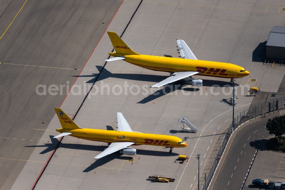 Neuhausen auf den Fildern from above - Freight plane cargo machine - aircraft of the DHL rolling on the apron of the airport in Neuhausen auf den Fildern in the state Baden-Wuerttemberg, Germany