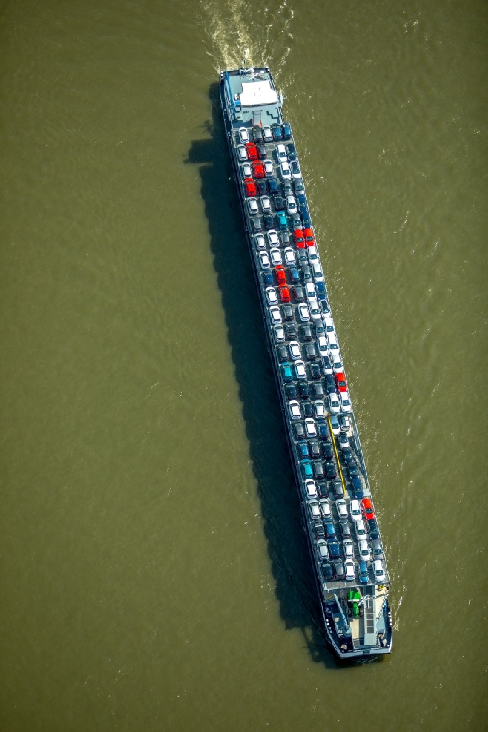 Aerial photograph Duisburg - Cargo ship on the inland shipping waterway of the river course of the Rhine river in Duisburg in the state North Rhine-Westphalia, Germany
