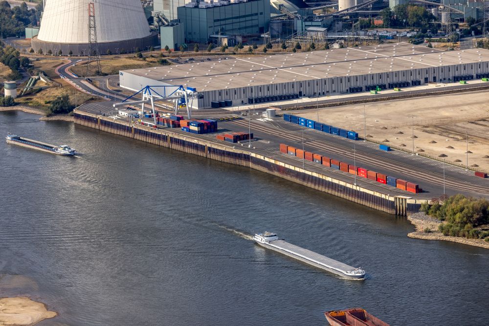 Duisburg from above - Cargo ship on the inland waterway of the river Rhine in the district Alt-Walsum in Duisburg in the Ruhr area in the state North Rhine-Westphalia, Germany