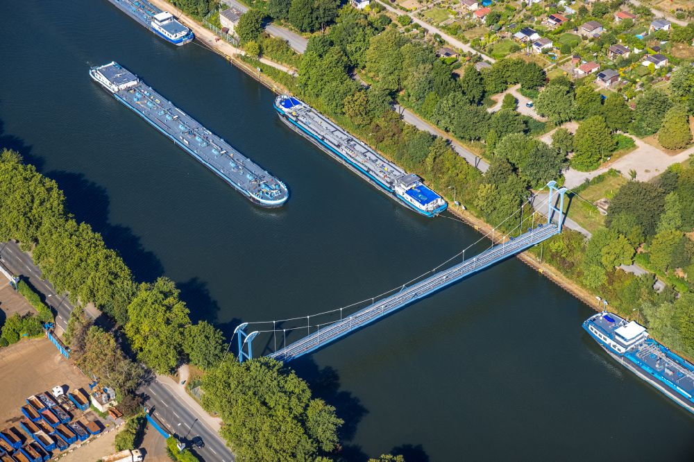 Gelsenkirchen from above - Cargo ship on the inland waterway of the Rhine-Herne Canal in the district Schalke-Nord in Gelsenkirchen in the Ruhr area in the state North Rhine-Westphalia, Germany