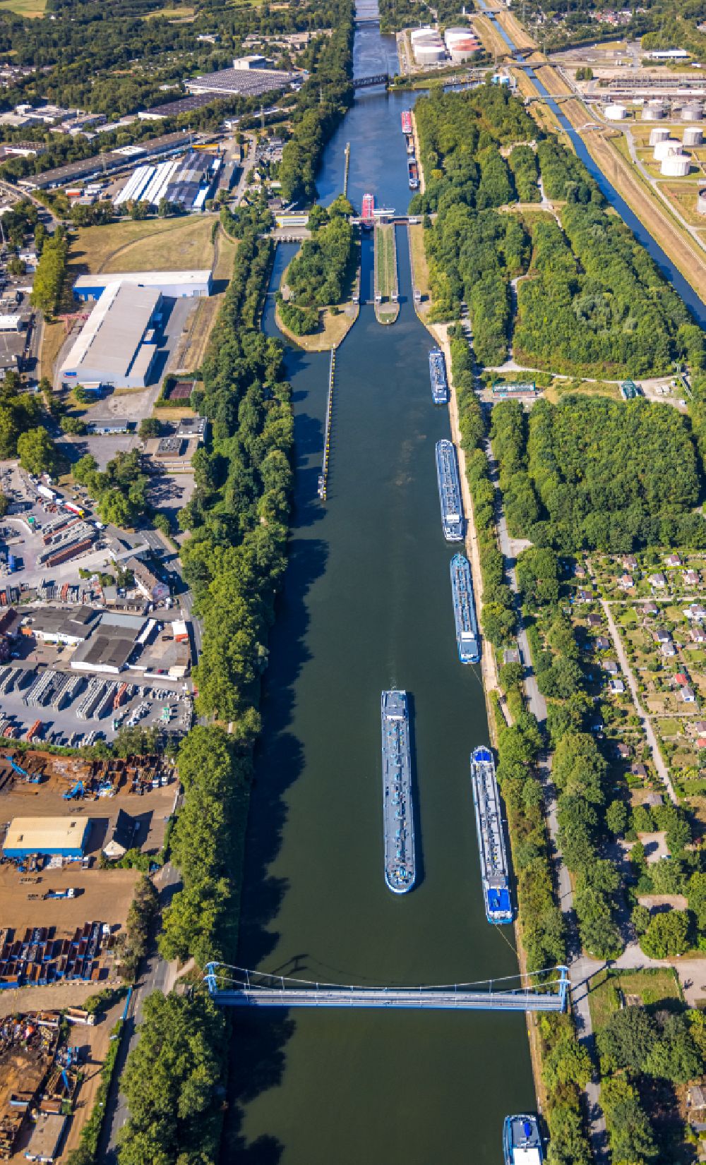 Gelsenkirchen from the bird's eye view: Cargo ship on the inland waterway of the Rhine-Herne Canal in the district Schalke-Nord in Gelsenkirchen in the Ruhr area in the state North Rhine-Westphalia, Germany