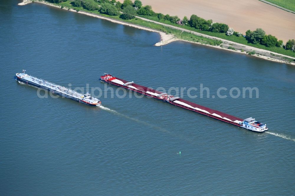 Aerial image Köln - Cargo ships and bulk carriers on the inland shipping waterway of the river course of the Rhine river in Cologne in the state North Rhine-Westphalia, Germany