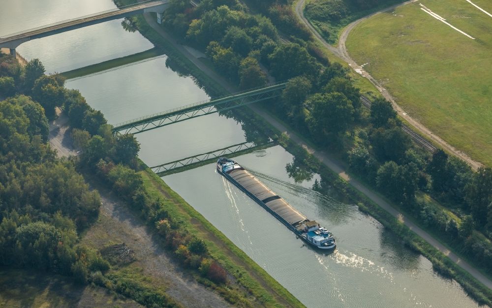 Dorsten from above - Cargo ships and bulk carriers on the inland shipping waterway of the river course of Wesel-Datteln-Kanal in Dorsten in the state North Rhine-Westphalia, Germany
