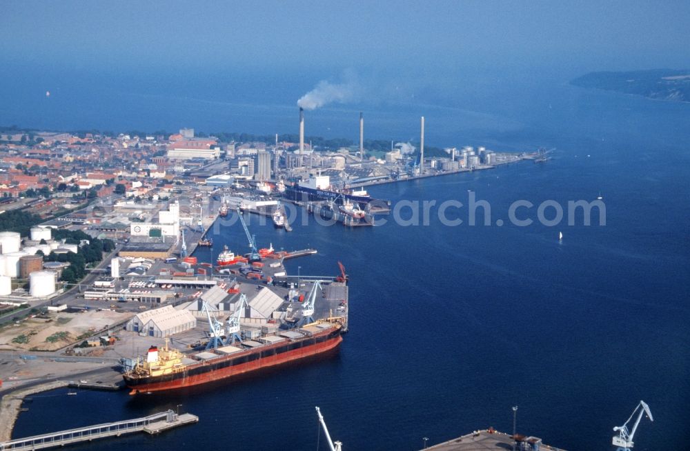 Fredericia from the bird's eye view: Cargo ships and bulk carriers at the quay at the harbor in Fredericia in the region of Syddanmark, Denmark