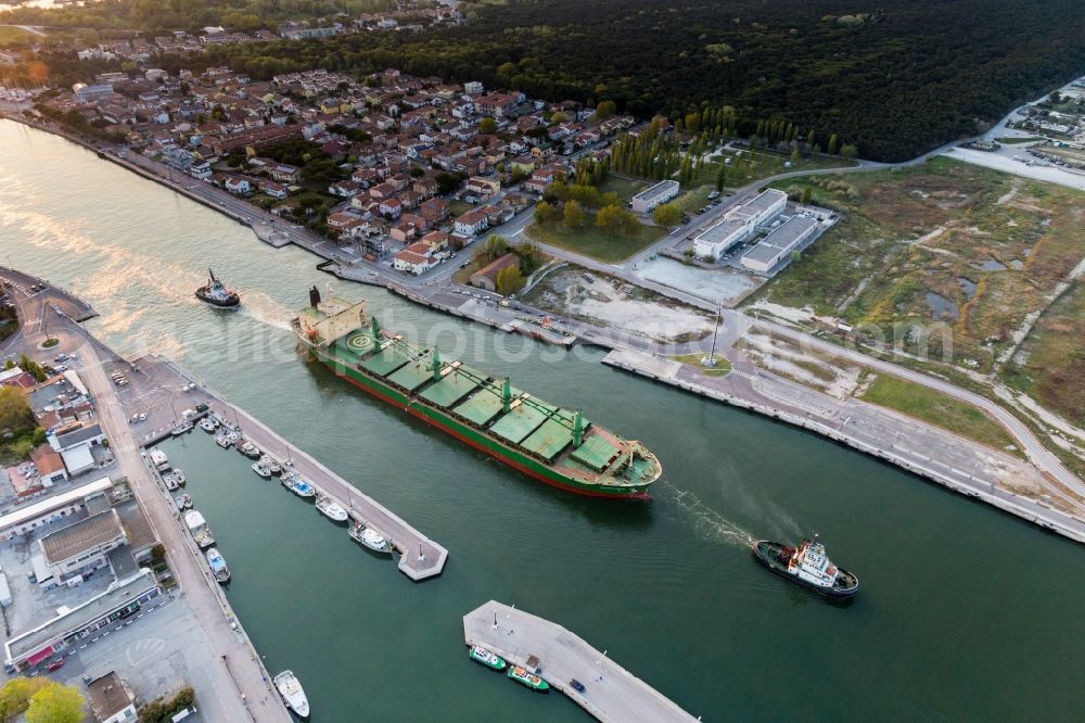 Aerial photograph Marina di Ravenna - Cargo ships and bulk carriers towed to the Adriatic sea in Marina di Ravenna in Emilia-Romagna, Italy