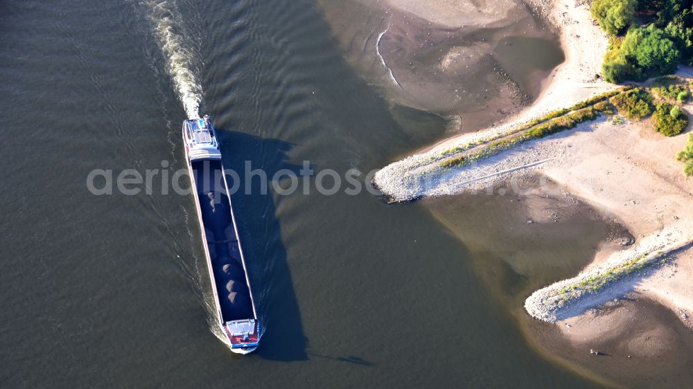 Aerial photograph Bad Honnef - Cargo ship with a reduced load due to low water on the Rhine in Bad Honnef in the state North Rhine-Westphalia, Germany