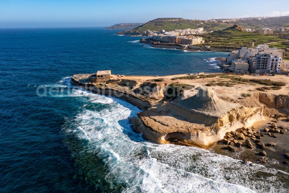 Marsalforn from above - Fragments of the fortress Qolla l-Bajda Battery in Marsalforn in Gozo, Malta