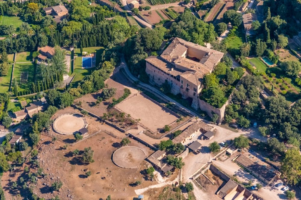 Valldemossa from the bird's eye view: Fragments of the fortress Son Moragues of the estate of an olive growing company on Avenida LluA?s Salvador Cilimingra in Valldemossa in Balearic island of Mallorca, Spain