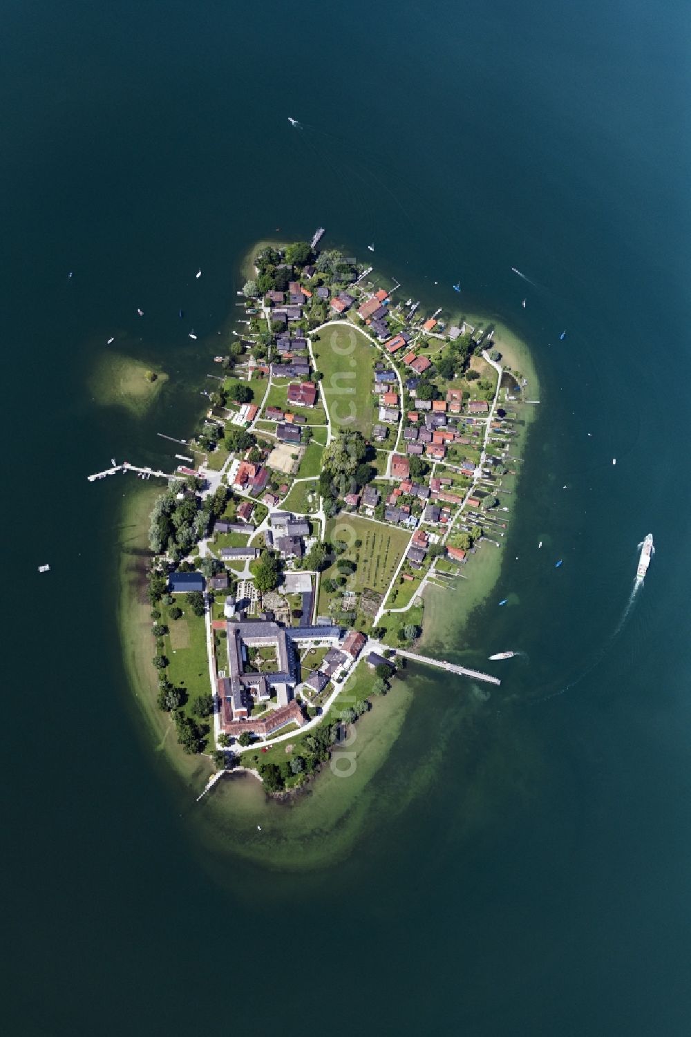 Chiemsee from above - Fraueninsel in the Chiemsee in the state of Bavaria, Germany with the abbey of the Benedictine women Frauenwoerth